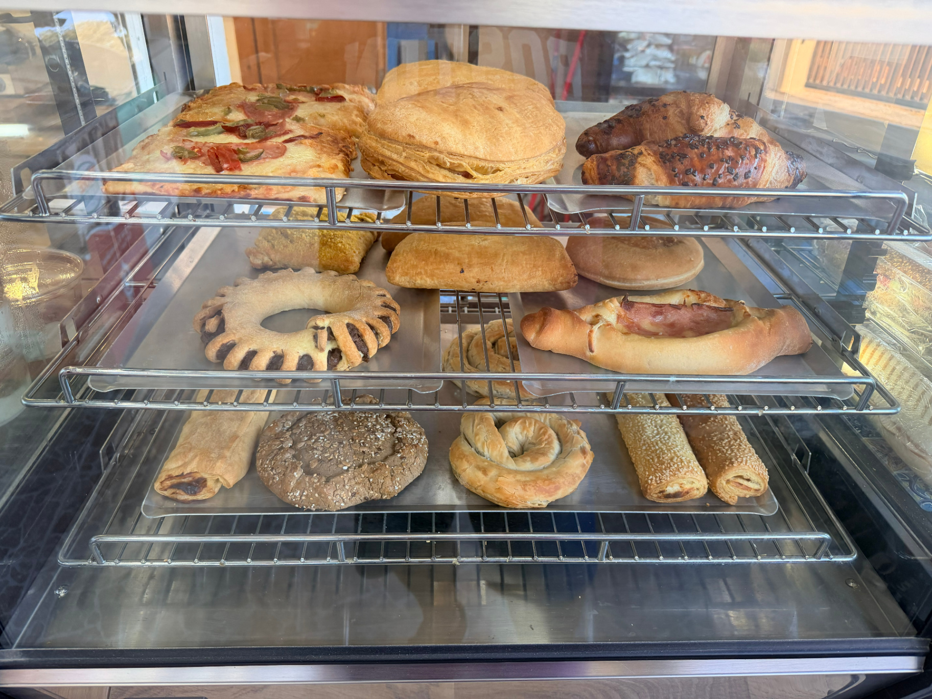 Fresh pies, croissants and pastries at AMOS SEASIDE Mini Market, Marathi Beach, Chania